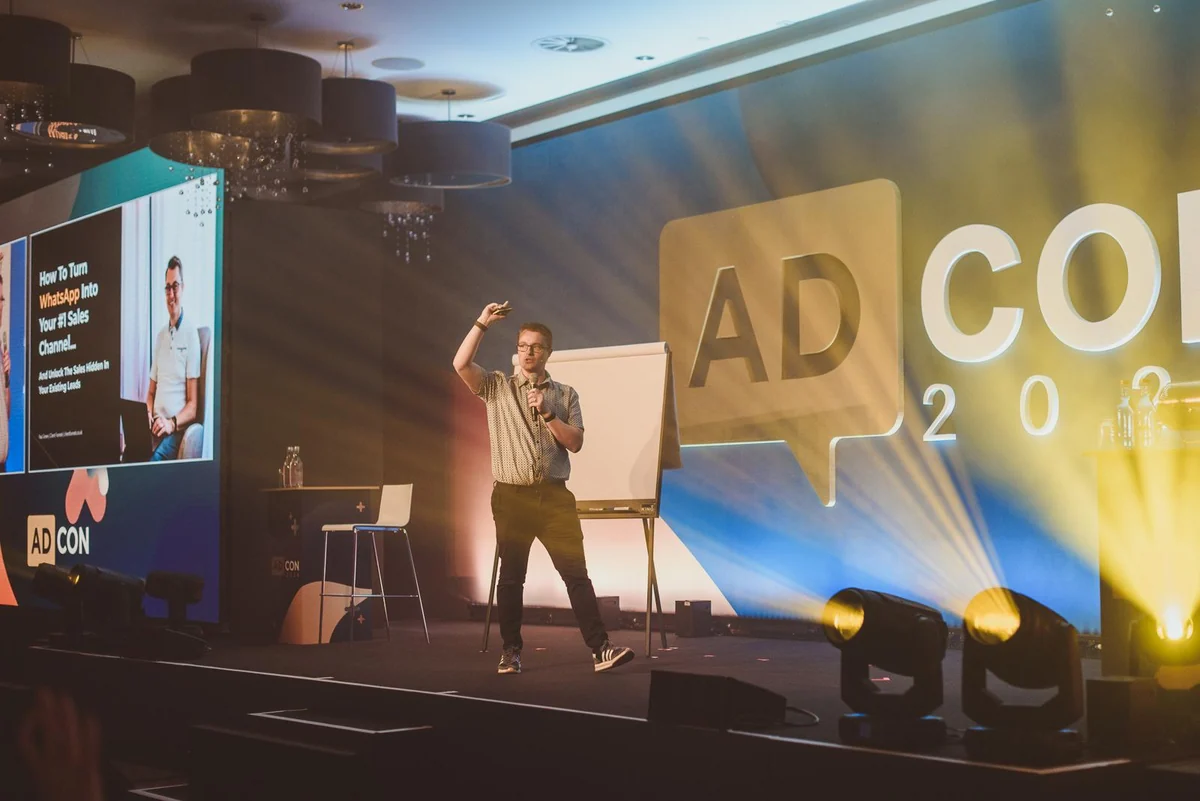 Paul Green presenting a WhatsApp sales session on stage